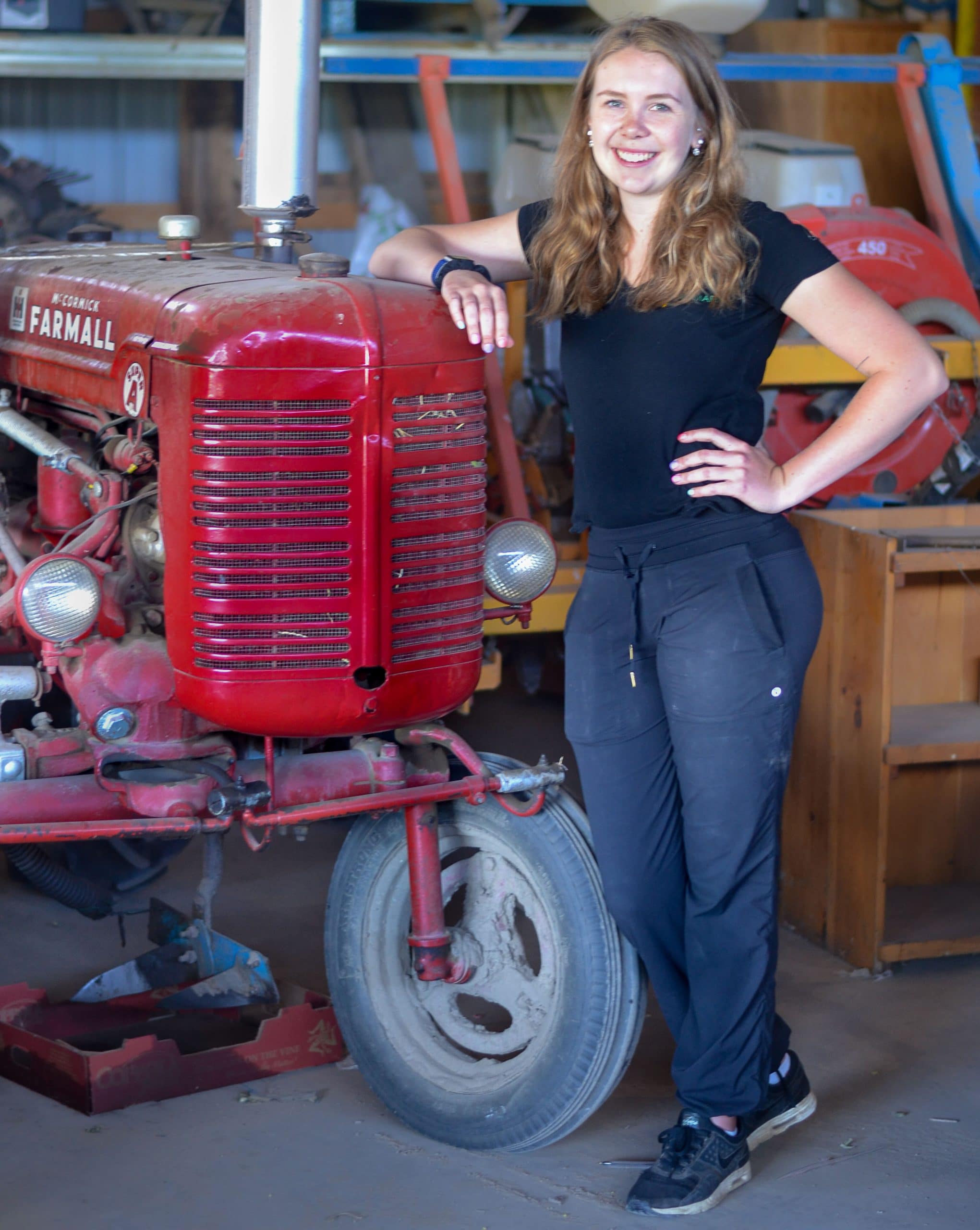 Kaylee Pillon with a Tractor
